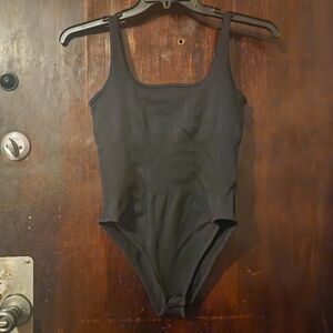 Black ribbed body suit